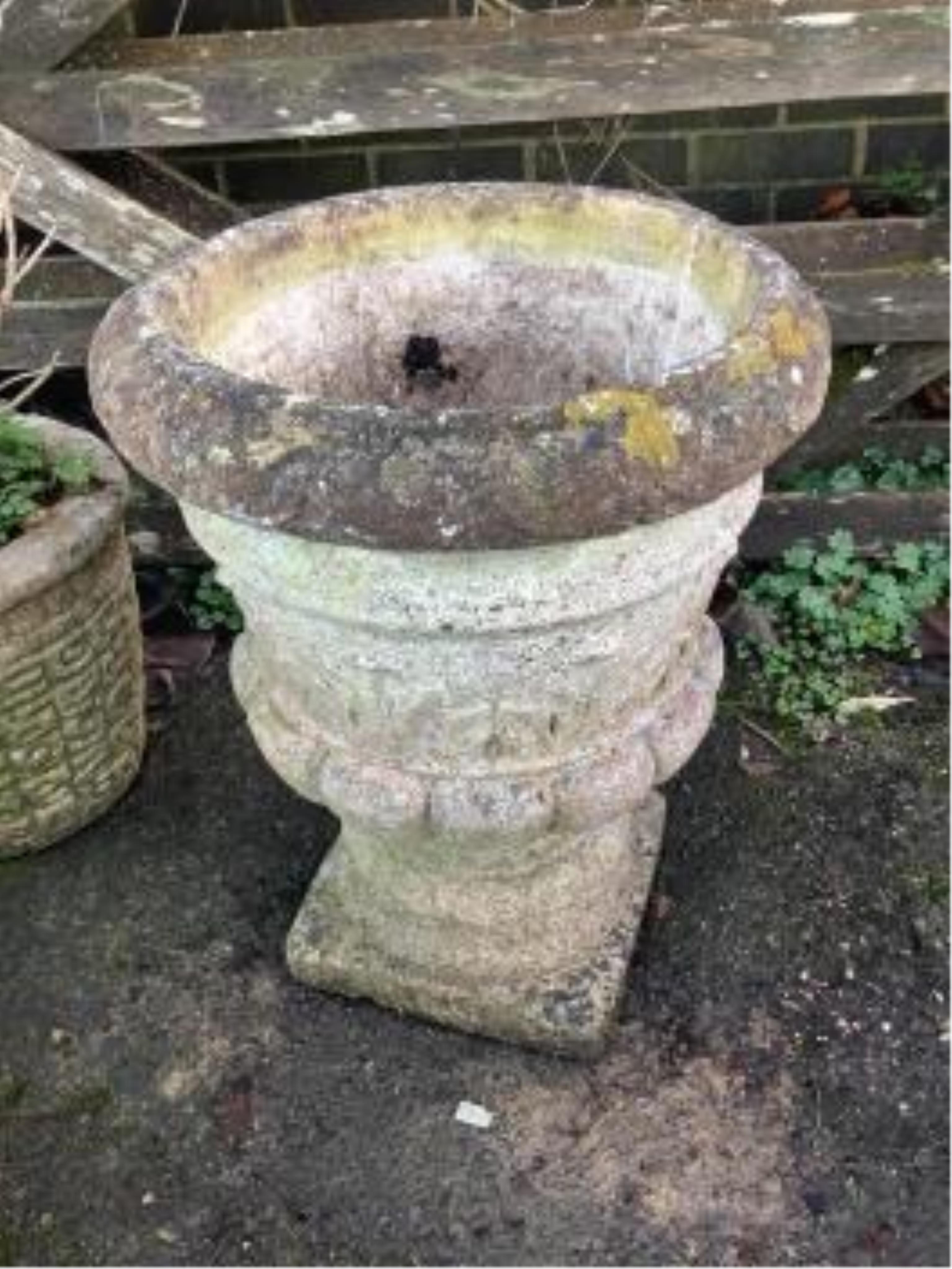 Three reconstituted stone garden planters, largest height 54cm and a reconstituted stone sundial, with bronze dial and gnomon, height 86cm. Condition - fair